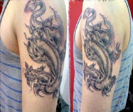 Chinese Dragon Pic Tattoo On Left Arm